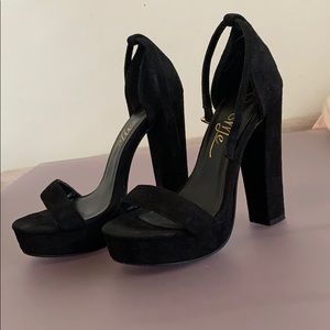Solid black block heels